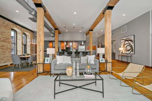 Stunning open floor plan with exposed beams and large windows welcome you to unit #301.