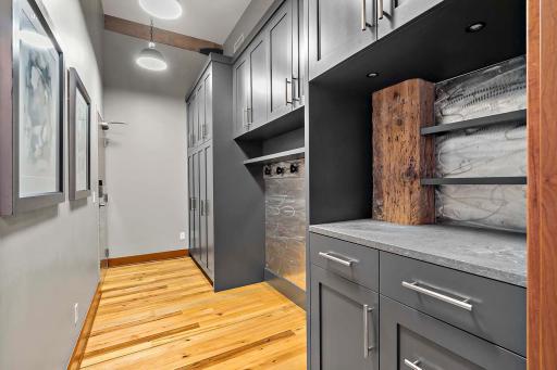 Newer mudroom with custom built-ins. Private second entrance located in the mudroom.
