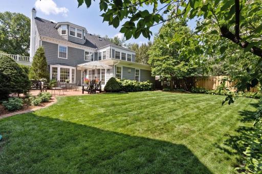 Generous country club backyard is level and flat