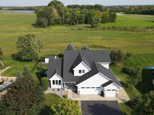The next 5 photos are aerial views of the home and land around the home