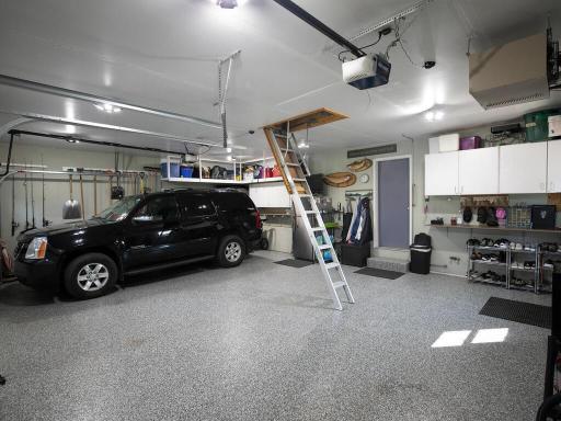 Garage or expanded living space? To me there is nothing better than a finished and heated garage with epoxy floor and additional storage space up in the rafters.