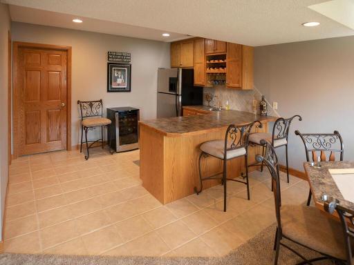 Nothing better then to have a wet bar/mini-kitchen in the lower level complete with full size refrigerator, microwave and dishwasher.