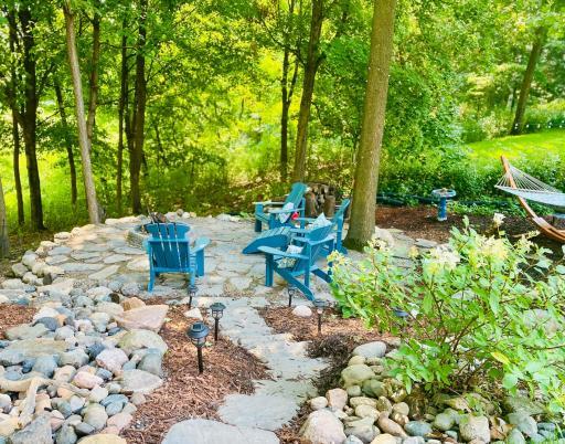 Make memories entertaining your family and friends at the stone patio and fire pit.