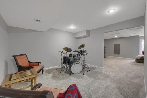 Additional space in the lower level for workout, music or game room.
