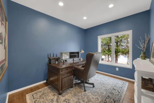 Enjoy working from home with a lake view from the spacious main floor office!