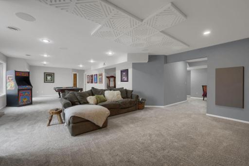 Excellent space in the lower level family room. Ceiling has built in speakers, homeowner will leave 4 channel amplifier. Plenty of room for a sectional, which homeowner is willing to leave with the home.