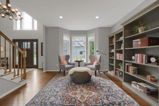 Enjoy a book in the living room off of the foyer. Bay window provides plenty of natural light and additional space.