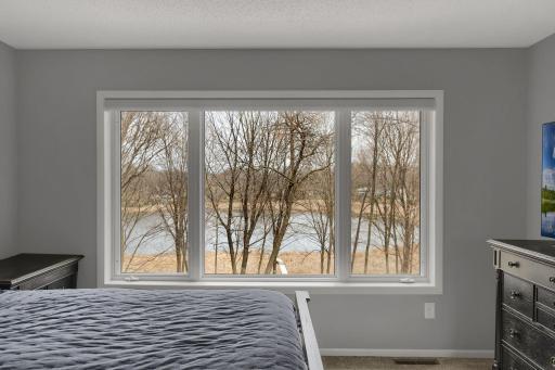 A wonderful view of lake from the primary bedroom.