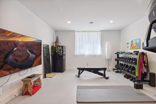 Fully finished, the lower level features room for an additional Family Room - currently used as an Exercise Room.