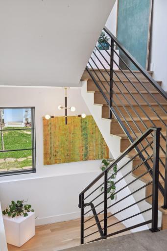 With wide walkways, large windows and custom open railings the stair cases are beautifully crafted to create a statement.