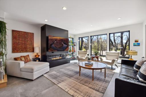 Three large windows overlook the private backyard and provide uninterrupted views of the wetlands.