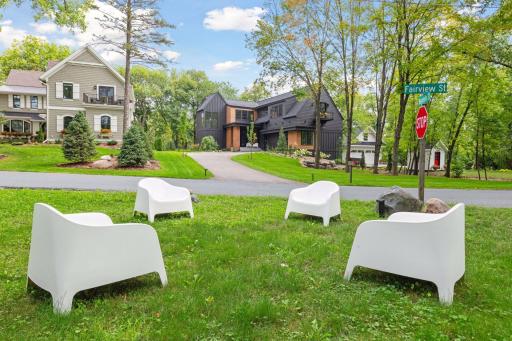 Seated at the foot of the driveway is a second parcel of land that will convey with the home.