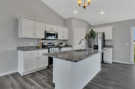 Pictures are of a like model home in a different location. Exterior and interior finishes may different in actual home.