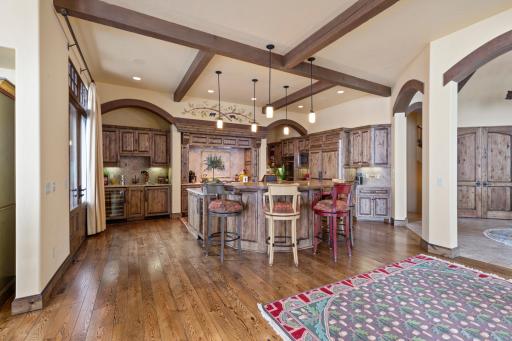 Designed for entertaining, the gourmet kitchen, with professional grade appliances, will not disappoint.