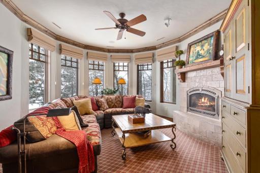 The lower level showcases the family room and two generously sized guest suites.