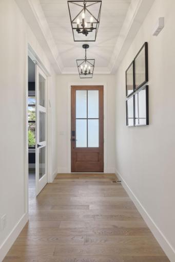 Impressive front entry features vaulted ceilings.