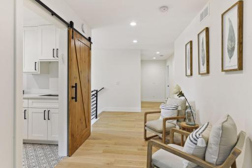 Upper level also features Junior Suite, two additional bedrooms connected through Jack & Jill bathroom and laundry room.