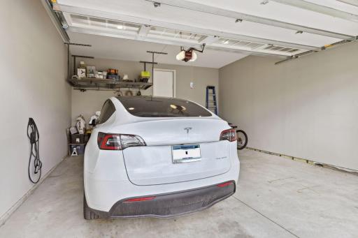 Attached 2 car garage with electric vehicle charger.