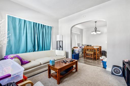 Front door facing in the living room and dining