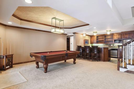 Wet bar and billiard area are great for entertaining