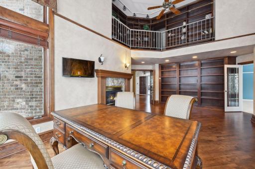 Don't miss the hidden staircase that leads to the upper library area