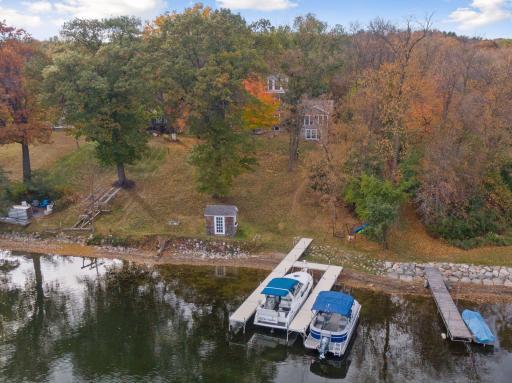 Enjoy year-round beauty and outdoor recreation on 100’ of lakeshore. The sandy beach is ideal for boating, paddling, fishing, swimming, and campfires.