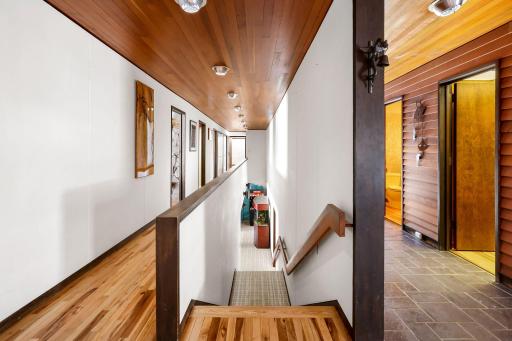 Wide, impressive space leads through the home to the lower level.