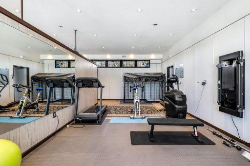 The main floor, mother-in-law suite features its own private entrance, a workout space, a kitchen, a bedroom, a full bathroom and heating and cooling controlled separately from the main house.