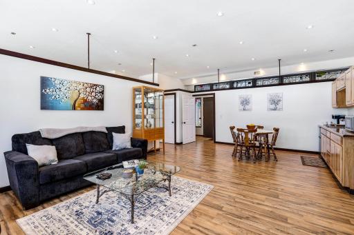 The main floor, mother-in-law suite features its own private entrance, a workout space, a kitchen, a bedroom, a full bathroom and heating and cooling controlled separately from the main house.