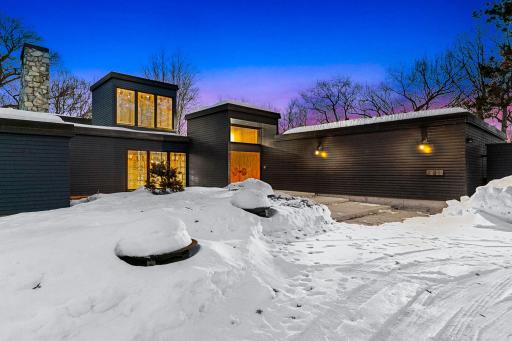 This recently restored, Frank Lloyd Wright inspired, mid-century modern masterfully integrates with its 10+ acre setting along the shores of a private, recreational lake (known for its privacy and great fishing).