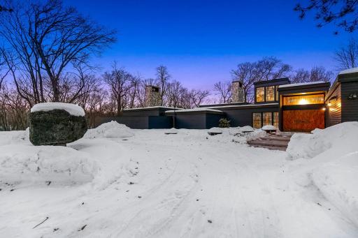 The home is thoughtfully perched on a hill with privacy, wildlife and stunning views surrounding it.