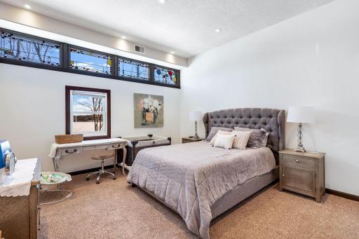 The main floor, mother-in-law suite features its own private entrance, a workout space, a kitchen, a bedroom, a full bathroom and heating and cooling controlled separately from the main house.