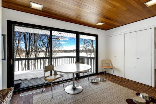 The craft room is located just off the kitchen and offers views of the lake.