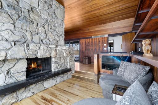 The sunk in reading nook walks out to another patio space.