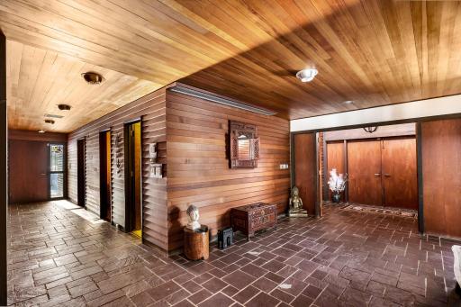 Off the front and garage entry you will find 2 spacious closets for storage and a half bathroom.