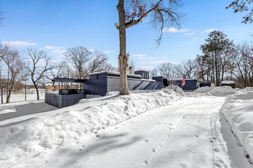 This rare 10+ acre plot of land features a range of usable elevations with incredible views, more than 1,000' of waterfront, a private beach & lagoon for fishing, multiple patio spaces and a limestone road to transport you to it all by ATV.