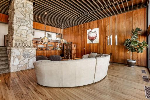 Beautiful hickory flooring spans the living room space.