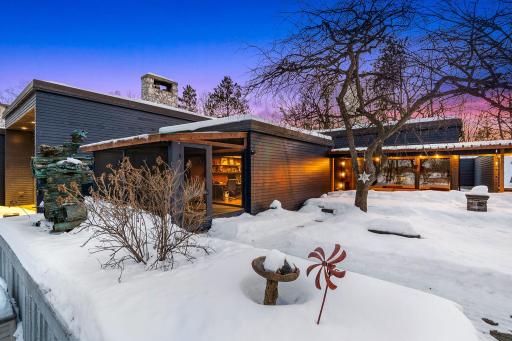 Enjoy extensive landscaping, patio and entertaining spaces throughout this stunning property.