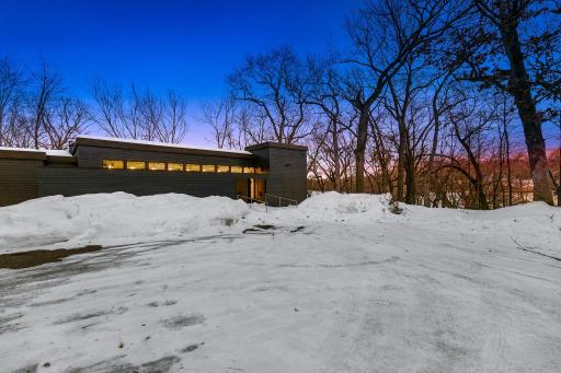 The home is thoughtfully perched on a hill with privacy, wildlife and stunning views surrounding it.