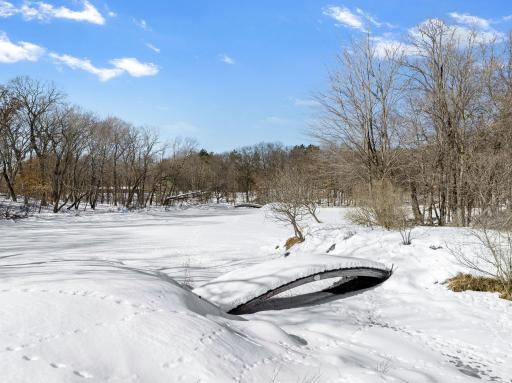 This rare 10+ acre plot of land features a range of usable elevations with incredible views, more than 1,000' of waterfront, a private beach & lagoon for fishing, multiple patio spaces and a limestone road to transport you to it all by ATV.