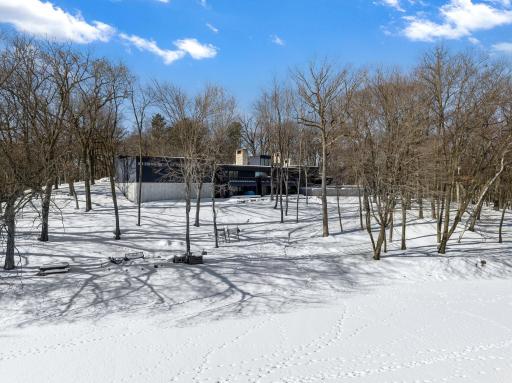 This rare 10+ acre plot of land features a range of usable elevations with incredible views, more than 1,000' of waterfront, a private beach & lagoon for fishing, multiple patio spaces and a limestone road to transport you to it all by ATV.