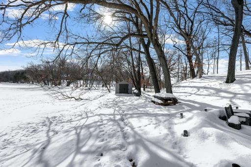 This rare 10+ acre plot of land features a range of usable elevations with incredible views, more than 1,000' of waterfront, a private beach & lagoon for fishing, multiple patio spaces and a limestone road to transport you to it all by ATV.