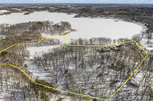 Approximate property boundaries outline a range of usable elevations with incredible views, more than 1,000' of waterfront, a private lagoon for fishing and a private beach.