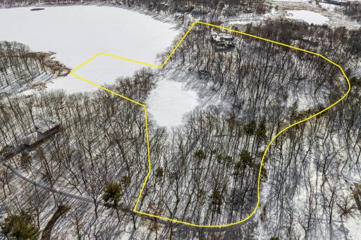 Approximate property boundaries outline a range of usable elevations with incredible views, more than 1,000' of waterfront, a private lagoon for fishing and a private beach.