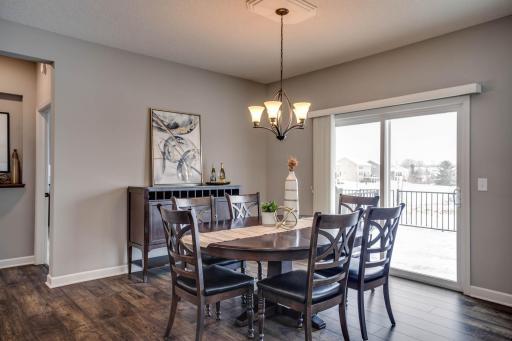 The large dining area features plenty of space for a table AND matching buffet, plus steps directly out to the backyard deck. This entire level is absolutely flooded with natural light!