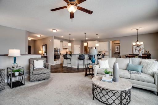 The open design concept you have been looking for! The great room, kitchen and dining area flow effortlessly together allowing for individual use, while also giving you the perfect set-up when entertaining!