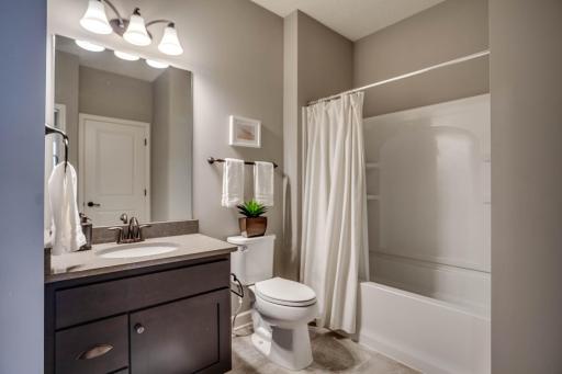 An excellent addition, the full bath on the main level is just off the foyer and works perfectly as a guest bathroom.