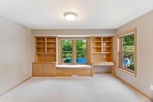 Lower Level Bedroom w/Walk-In Closet & Built-In Cabinetry