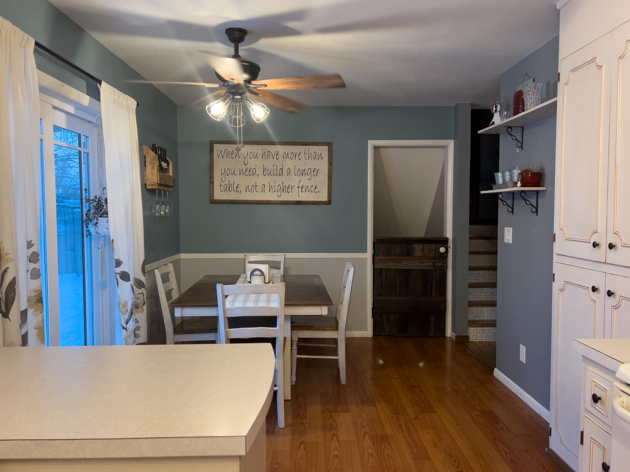 View of dining area and stairway.
