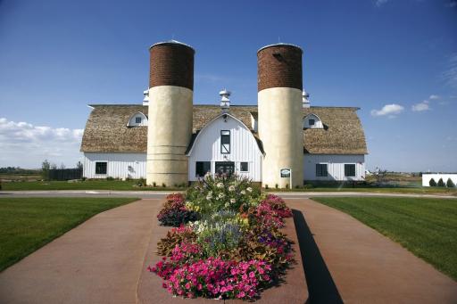 The Barn.... a One of a Kind Community Center. Offers gorgeous gathering spaces, kitchen, game and TV area, fitness room, pool and zero entry pool, park, basketball, sand volleyball and more!